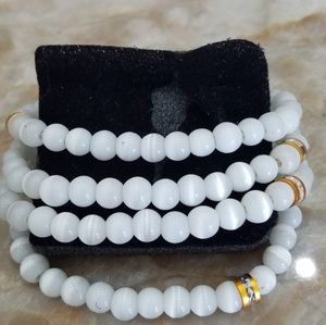 NEW! 4 INDIVIDUAL WHITE BEADED BRACELETS